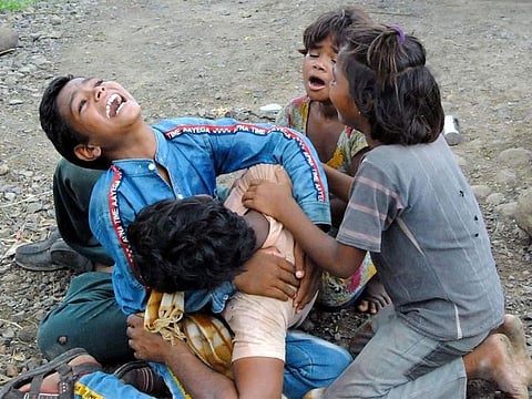 A photo of the Dalit couple's children weeping went viral on Twitter.