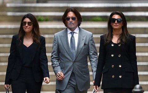Actor Johnny Depp leaves the High Court in London, Britain, on July 16, 2020.