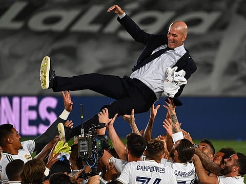 Zinedine Zidane, Real Madrid coach, being given a victory bump his players after the 'Los Blancos' won the La Liga crown on Thursday night.