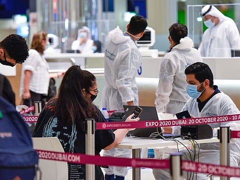 Passengers seen arriving at Terminal 3, Dubai International Airport.