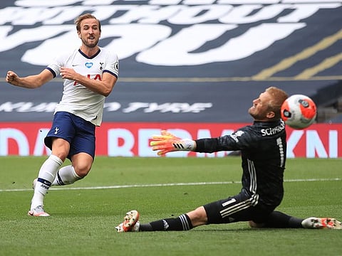 Tottenham Hotspur's Harry Kane scores past Leicester City's Kasper Schmeichel