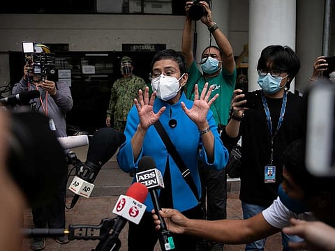 Rappler CEO and Executive Editor Maria Ressa leaves a regional trial court after pleading not guilty to tax evasion charges, in Pasig City, Metro Manila, Philippines.