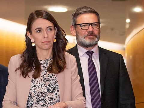 New Zealand Prime Minister Jacinda Ardern arrives for a post-Cabinet press conference with Immigration Minister Iain Lees-Galloway at Parliament in Wellington, New Zealand, on July 6, 2020. Ardern said Wednesday, July 22, 2020 she has fired Lees-Galloway for having an inappropriate relationship with a subordinate.