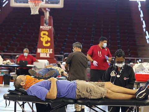 A man gives blood at a Red Cross blood drive, as the global outbreak of the coronavirus disease (COVID-19) continues, in Los Angeles, California, U.S., July 22, 2020.