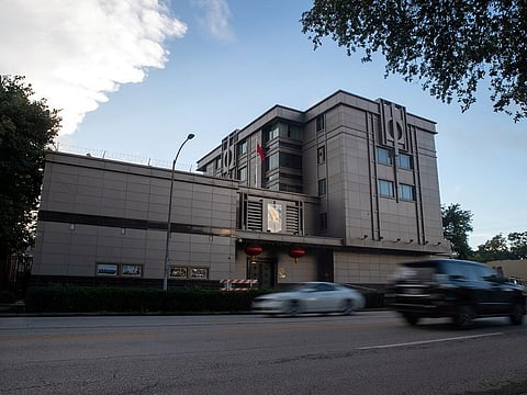Vehicles pass by the China Consulate General in Houston, Texas, U.S., July 22, 2020.