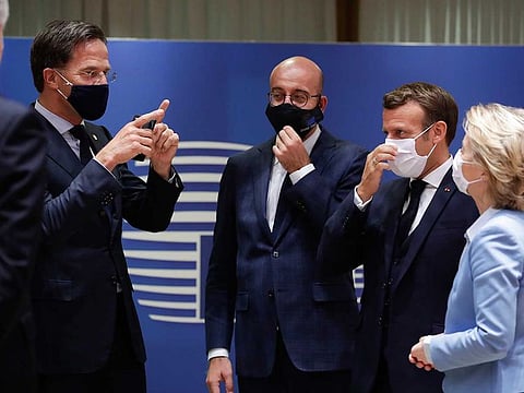 From left: Dutch Prime Minister Mark Rutte, European Council President Charles Michel, French President Emmanuel Macron and European Commission President Ursula von der Leyen attend a round table meeting at an EU summit in Brussels on July 21, 2020.