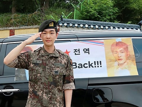 Onew discharged after completing his military service