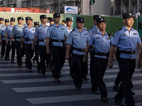 Chinese policemen prepare for duty around a neighbourhood sealed off before the official closure of the United States Consulate in Chengdu in southwest China’s Sichuan province, Monday, July 27, 2020.
