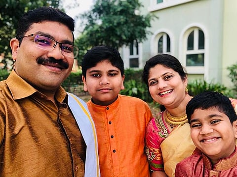 Shashidar Magarajappa with his wife and two sons