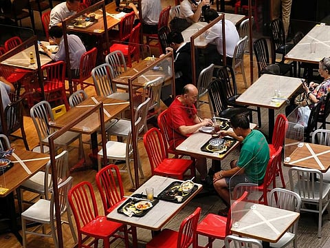 Social distancing marks are seen at a restaurant following the coronavirus disease (COVID-19) outbreak in Hong Kong on July 27, 2020.