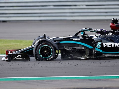 Lewis Hamilton's tyre deflated on the final lap of the British Grand Prix.