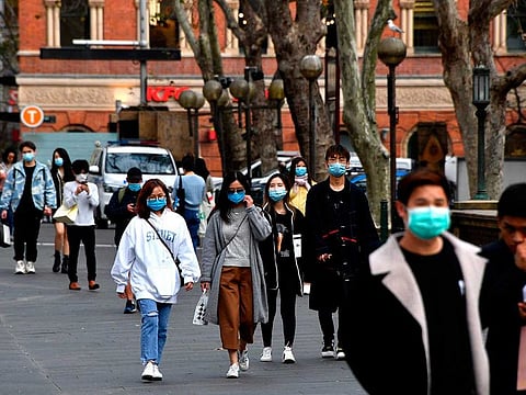 The death, a man in his 80s with underlying health conditions, marked a grim milestone for the country which has had to pause some parts of a staged reopening after nearly two years of stop-start lockdowns.