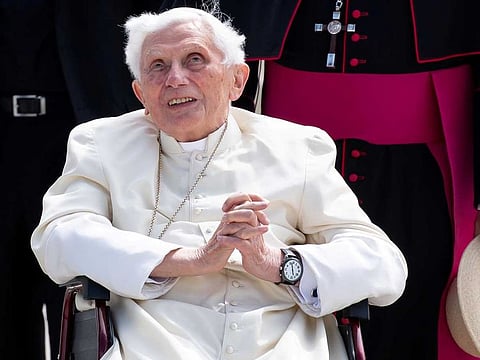 Pope Emeritus Benedict XVI gestures at Munich Airport before leaving for Rome, June 22, 2020. Reuters