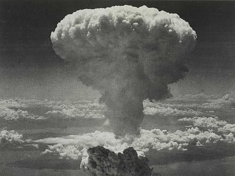 A mushroom cloud rises after an atomic bomb codenamed 'Fat Man' exploded after being dropped by a US Army Air Force B-29 bomber over Nagasaki August 9, 1945.