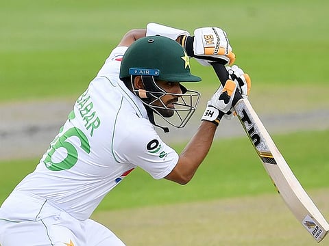 Pakistan's Babar Azam bats during the first day of the first cricket Test match against England at Old Trafford in Manchester, on August 5, 2020.
