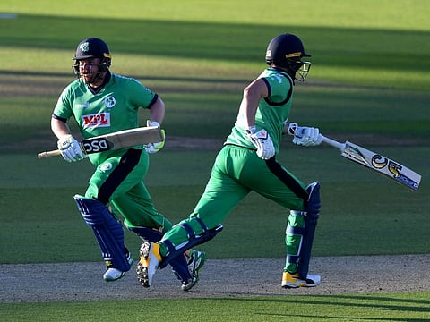 Ireland's centurions Paul Stirling (left) and Andy Balbirnie cross over for a single during their 214-run partnership against England in the third and final ODI on Tuesday.