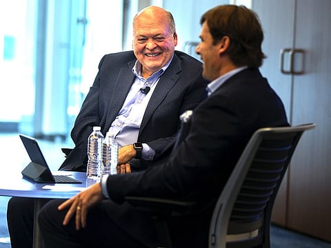 Outgoing CEO Jim Hackett (left) with new CEO Jim Farley