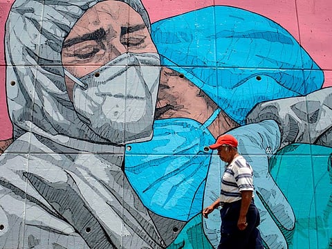 Acapulco, Guerrero State, Mexico. Street artists all over the world have ventured out into quiet streets and left behind thought-provoking art work on the crisis.