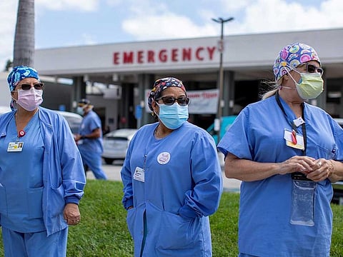 Healthcare workers at Fountain Valley Regional Hospital hold a rally outside their hospital for safer working conditions during the outbreak of the coronavirus disease (COVID-19) in Fountain Valley, California, US, August 6, 2020.