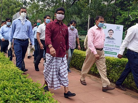 Jharkhand Chief Minister Hemant Soren wearing the traditional Adivasi cloth arrives to pay tribute to Nilambar Pitambar at Nilambar pitambar park, Morabadi on the day of World Adivasi day, in Ranchi on Sunday.