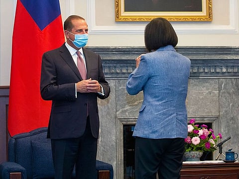 US Health and Human Services Secretary Alex Azar, left, is greeted by Taiwan's President Tsai Ing-wen, right, during a meeting in Taipei, Taiwan Monday, Aug. 10, 2020.