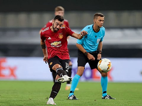 Manchester United's Portuguese midfielder Bruno Fernandes takes a free kick during their Europa League quarter-final against FC Copenhagen in Cologne on Monday.