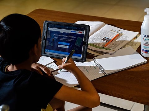 A student e-learning from his home. Photo: Virendra Saklani/Gulf News