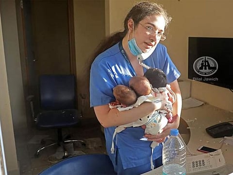 Nurse as she try to save three new born from blast