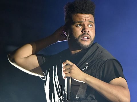 The Weeknd performs on day three at Lollapalooza in Grant Park on Saturday, Aug 4, 2018 in Chicago.