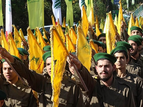 Hezbollah fighters take part in a military parade in the southern town of Ghazieh, south of the port city of Sidon, in this file picture.