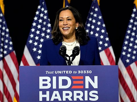 Kamala Harris speaks after Democratic presidential candidate Joe Biden introduced her as his running mate during a campaign event at Alexis Dupont High School in Wilmington, Delaware, Wednesday, August 12, 2020.