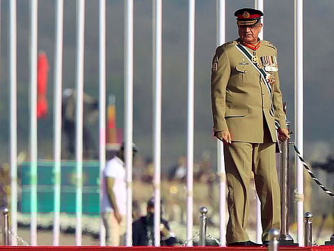 Pakistan's Army Chief of Staff Lieutenant General Qamar Javed Bajwa arrives to attend the Pakistan Day military parade in Islamabad