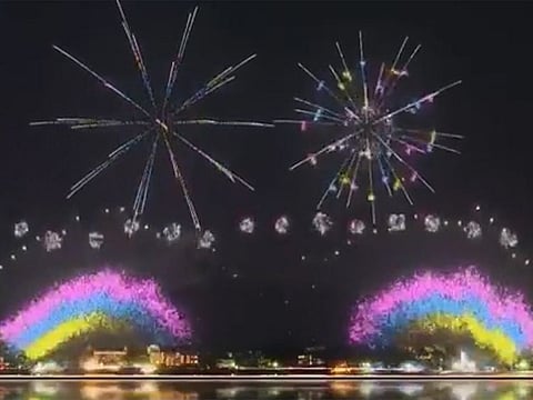 The simulated Olympic firework display in Tokyo Bay