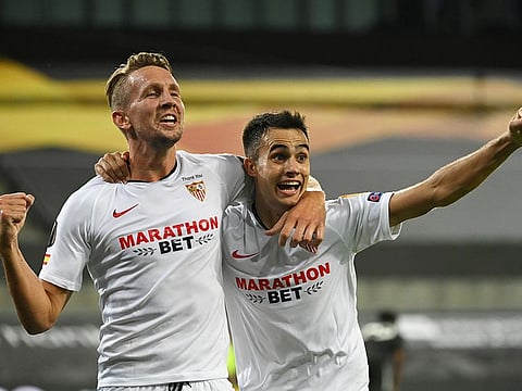 Sevilla's Luuk de Jong celebrates scoring their second goal.