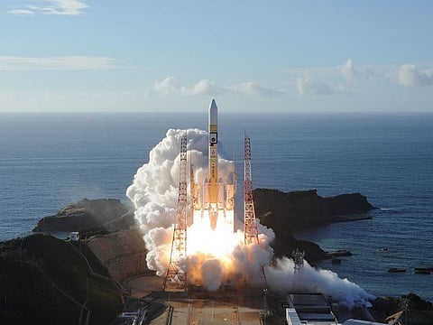 An H-2A rocket carrying the Hope Probe blasts off from Tanegashima Space Centre in southwestern Japan for the first Arab space mission to Mars.