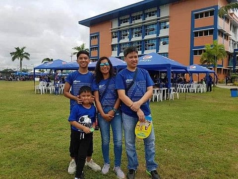 Michael Malayan with his wife Jiji and sons Jule and Mikee.