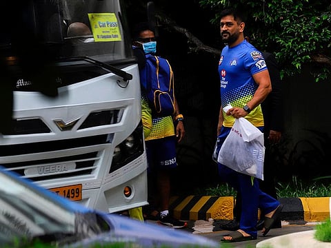 Chennai Super Kings captain Mahendra Singh Dhoni boards the team bus at the MA Chidambaram Stadium in Chennai after a practice session on Wednesday.