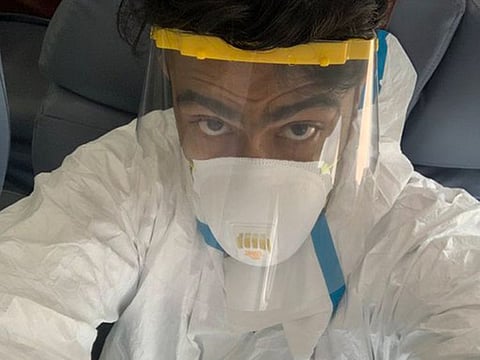 Delhi Capitals' Ravichandran Ashwin in full protective geat on the flight to the UAE