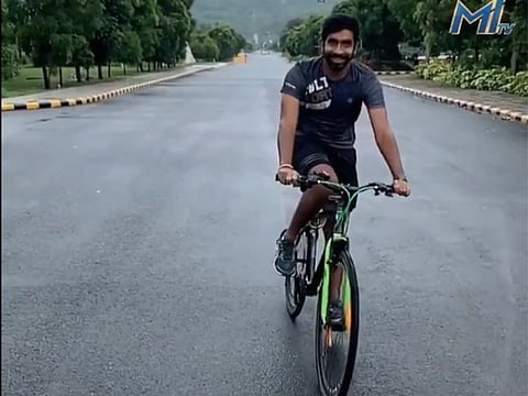 Mumbai Indians' Jasprit Bumrah on his bike