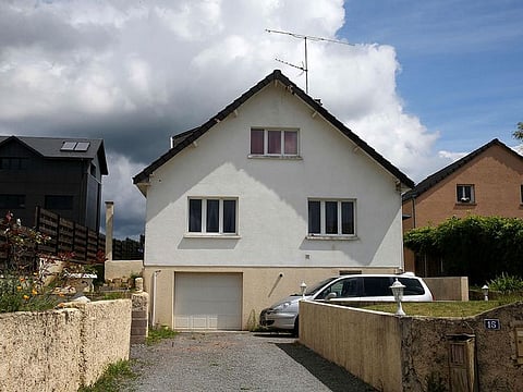 This file photo taken on June 19, 2020 shows the house of the serial killer Michel Fourniret in Ville-sur-Lumes, northern France, before being searched by police as part of the inquiry into the disappearance of Estelle Mouzin, a 9-year-old child missing since 2003. -