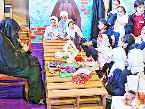 Children learn about heritage at an interactive session organised by the Sharjah Heritage Institute.