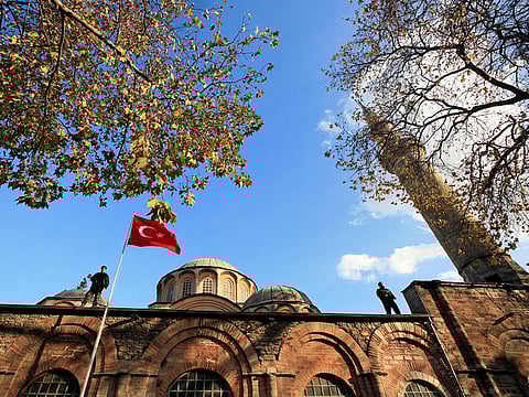 Turkish police officers stand guard atop the Kariye (Chora) museum, the 11th century church of St. Savior, during a visit by Britain's Prince Charles and his wife Camilla in Istanbul, November 28, 2007.