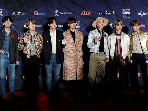 Members of South Korean boy band BTS pose on the red carpet during the annual MAMA Awards at Nagoya Dome in Nagoya, Japan, December 4, 2019. REUTERS/Kim Kyung-Hoon/File Photo