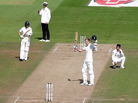 England's Zak Crawley celebrates reaching 200 runs during the second day of the third cricket Test against Pakistan at the Ageas Bowl in Southampton on Saturday. Crawley and non-striker Jos Buttler stitched together a record 359-run partnership for the fifth wicket.