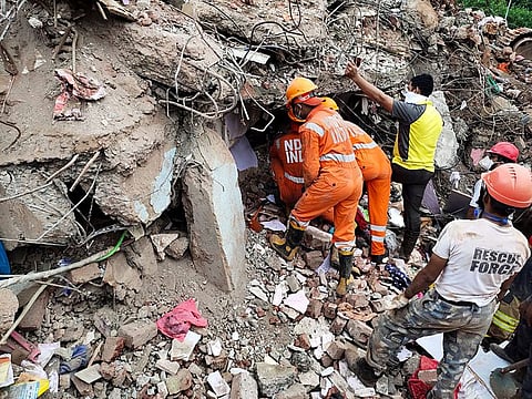 Search and rescue operation underway at the spot where a building collapsed in Kajalpura area of Raigad district on Monday.