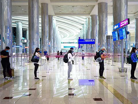 Passengers seen arriving at Terminal 3, Dubai International Airport as Dubai reopens International travel for tourists and residents