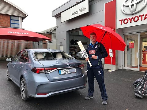 Kevin O'Brien with his damaged car