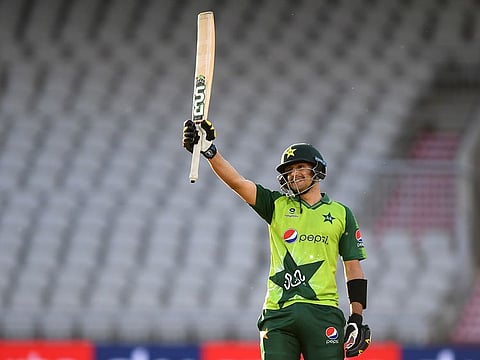 Pakistan's Haider Ali celebrates reaching his half century.