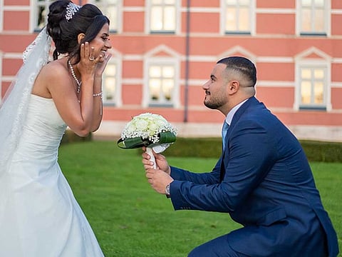 Mohamad who survived the 16th story fall when he was just three-year-old, with his wife Milad on their wedding day.