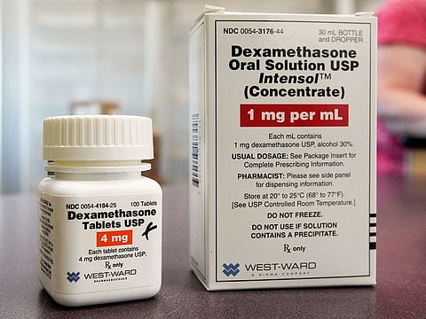 A bottle and box for dexamethasone in a pharmacy in Omaha, Neb. New studies confirm that cheap steroid drugs improved survival for severely ill COVID-19 patients, cementing this as a standard of care and expanding options to more types than this one previously shown to help.